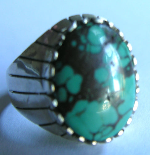 Anon. Navajo ring (10+-); probably from the 60-70's, with Storm Mtn or Persian turquoise stone.